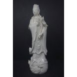 A Chinese Blanc de Chine figure of Guanyin, with incised number to interior, H.29cm