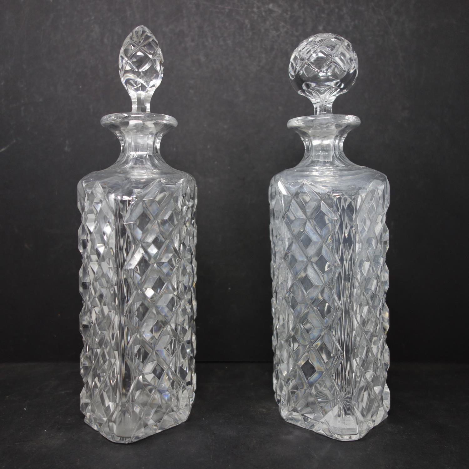 A pair of vintage crystal decanters, one with replaced stopper, H.26.5cm and H.27cm - Image 2 of 4