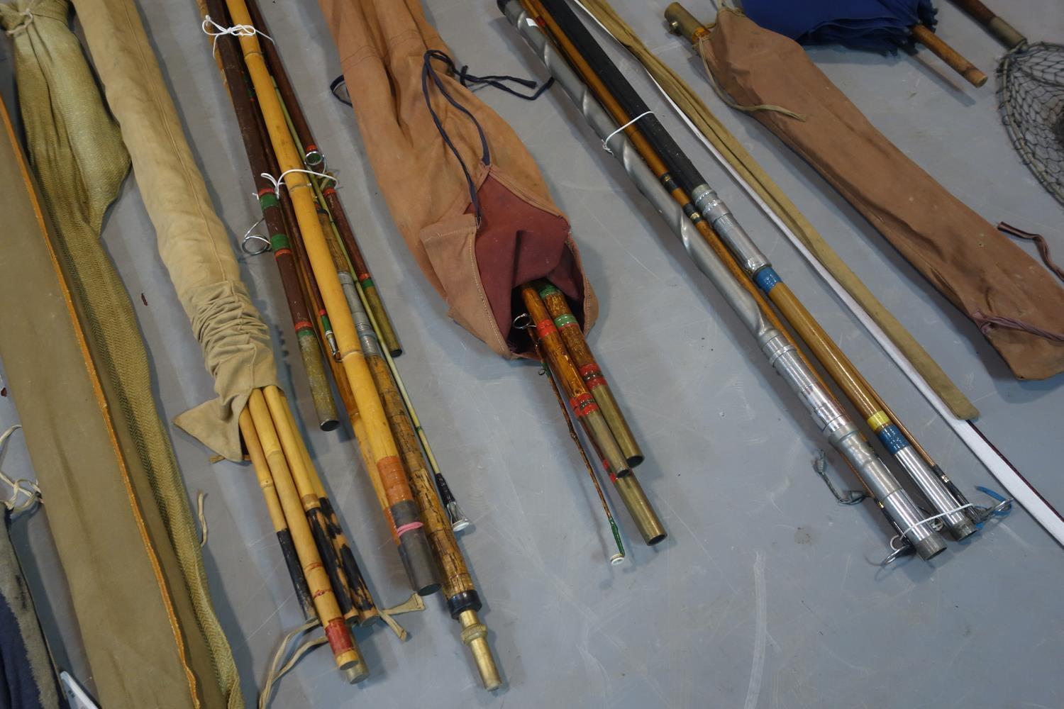 A collection of 10 vintage fishing rods to include 2 split cane and 8 bamboo, together with an - Image 2 of 3