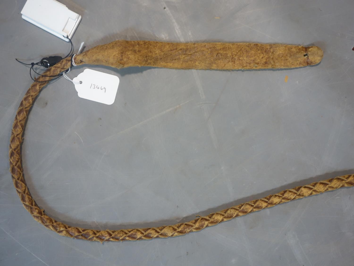 A vintage 8ft brown leather bull whip - Image 3 of 3