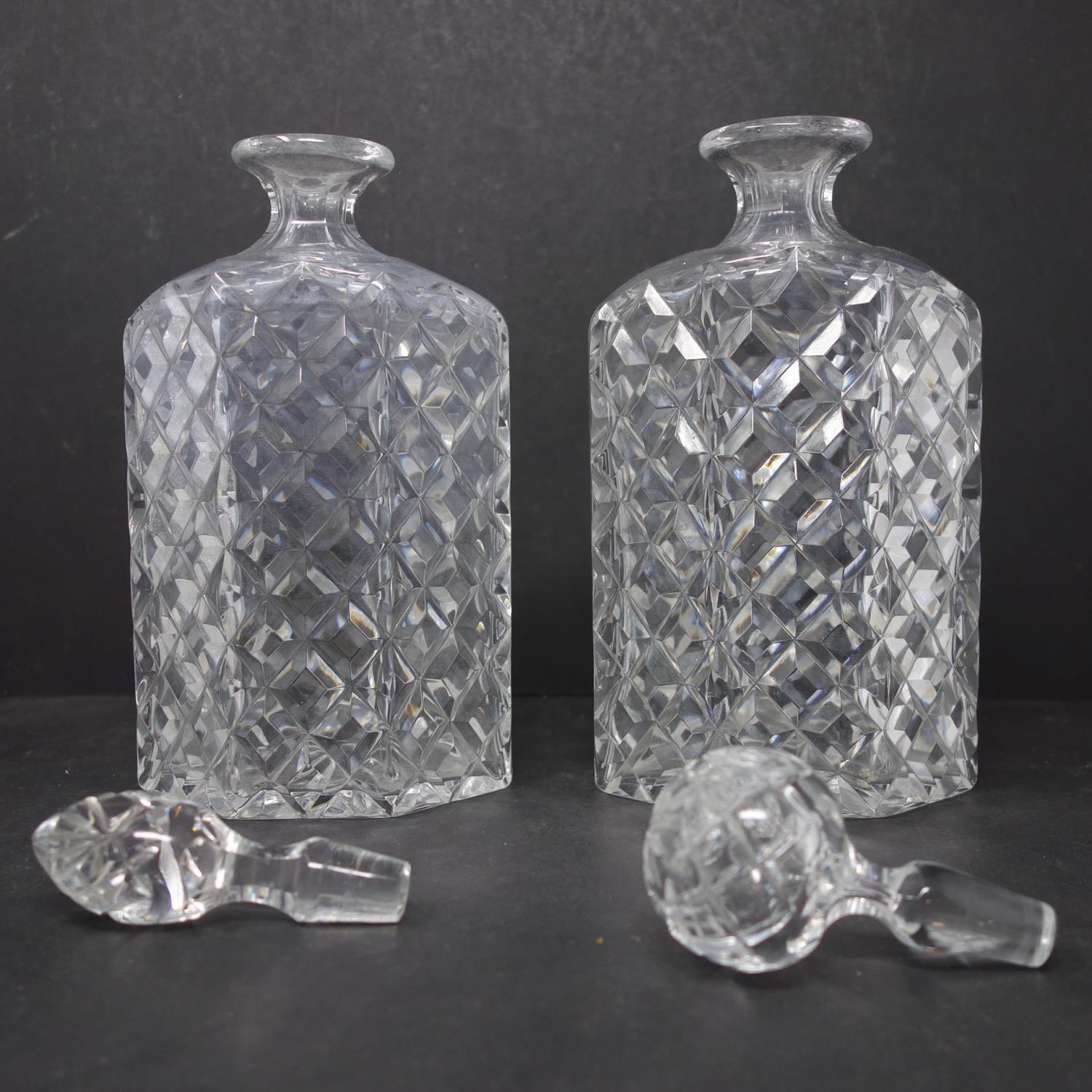 A pair of vintage crystal decanters, one with replaced stopper, H.26.5cm and H.27cm - Image 4 of 4