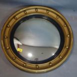 A Regency style gilt circular convex mirror, Diameter 57cm