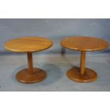 A pair of Ercol teak circular occasional tables, H.44cm Diameter 55cm