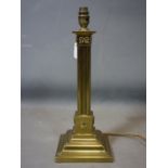 A Regency style brass column table lamp, on stepped square base, H.142cm