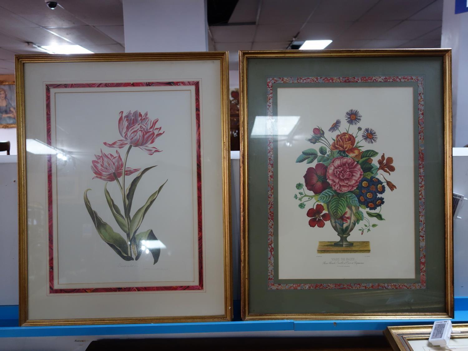 Two prints of flowers, both within floral border, framed and glazed, 40 x 26cm and 40 x 25cm