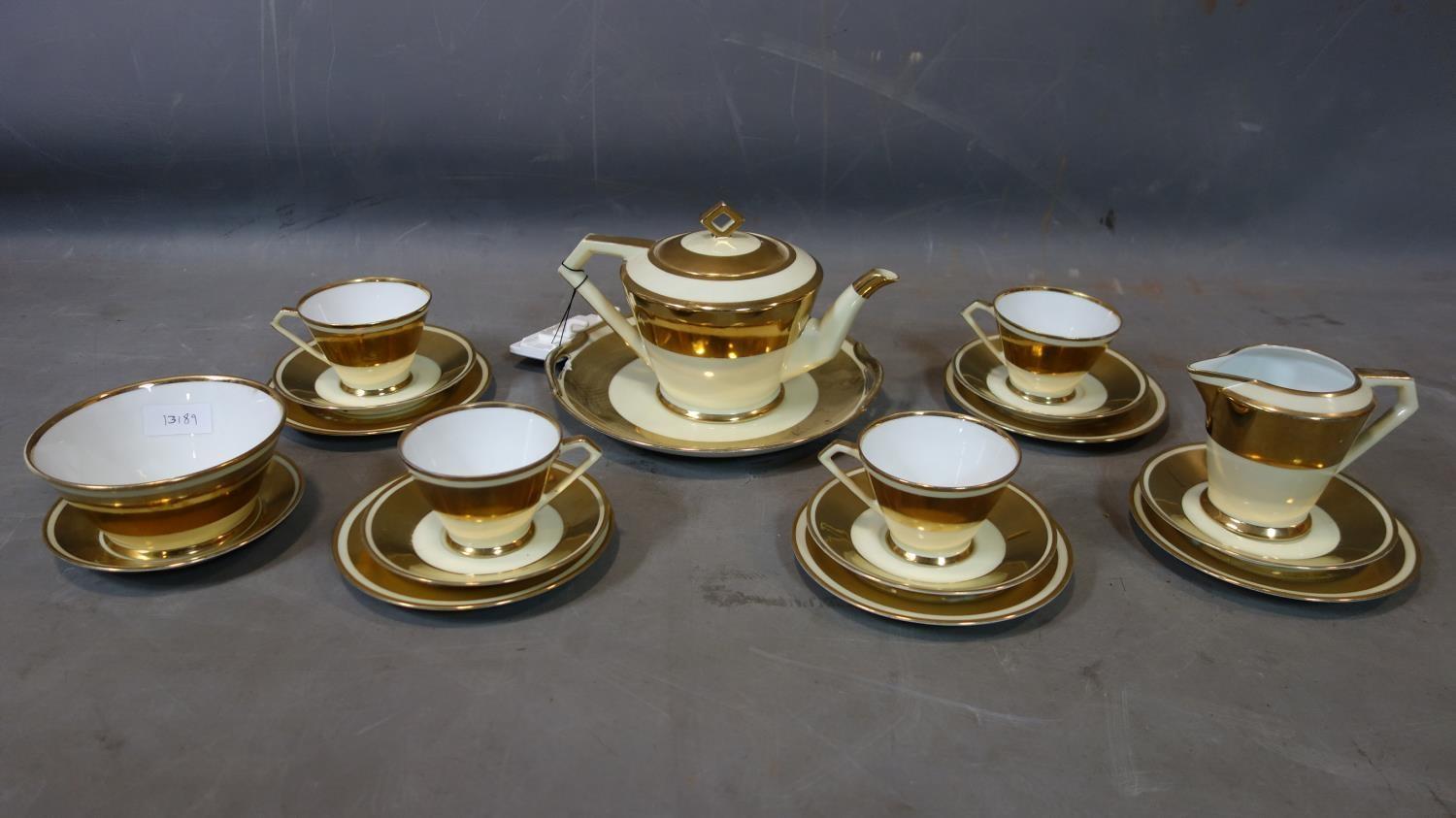 A 20th century Noritake part gilt tea set
