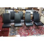 A set of 10 contemporary dining chairs in faux black leather, raised on brushed steel legs
