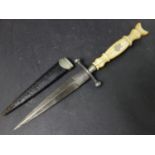 A 19th century ivory handled dagger, possibly Russian, the blade with floral niello decoration, with