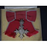 A mid 20th century M.B.E medal, in original case, with certificate and a signed letter from