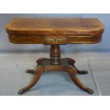 A Regency rosewood card table, with brass inlay, raised on 4 sabre legs, H.70 W.92 D.90cm