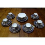 A set of six 19th century Coalport blue and gold porcelain tea cups and saucers, decorated with