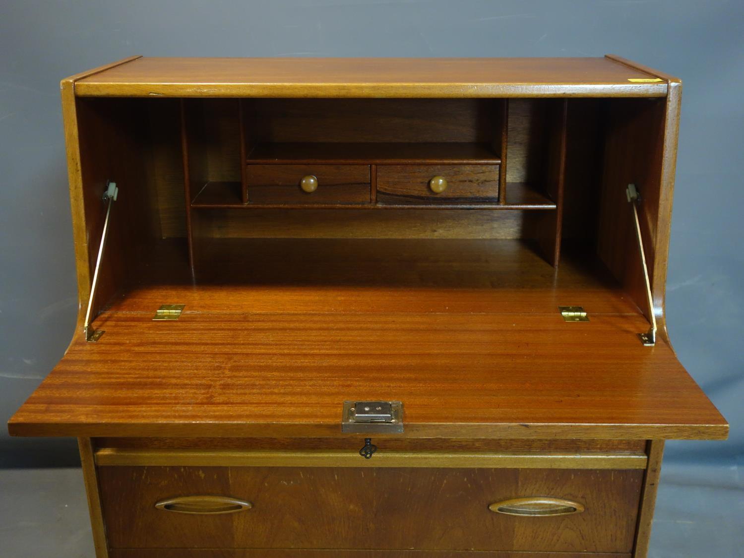 A teak bureau with drop flap above four drawers, on tapered feet, H.107 W.76 D.41cm - Image 2 of 3
