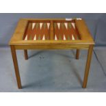 A 20th century satinwood backgammon table, with pieces and dice