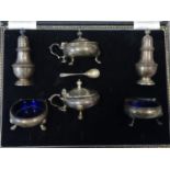 A cased silver cruet set by Mappin & Webb, lacking 3 spoons