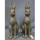 A pair of moulded hares, H.61cm