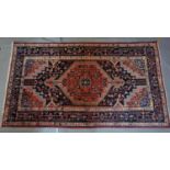 A Northwest Persian Koliahee rug, central diamond medallion with repeating geometric motifs on a