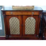 A Regency rosewood chiffonier, with glass top above long drawer and two doors with brass grills