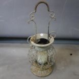 A metal storm lantern, H.53cm