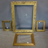 Four antique carved giltwood picture/mirror frames, largest 95 x 129cm