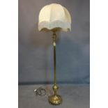 A 20th century brass standard lamp, with shade, H.140cm