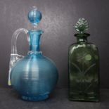 An antique Venetian blue glass decanter, H.27cm, together with a Victorian green glass decanter with