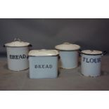 Four vintage enamelled bread bins
