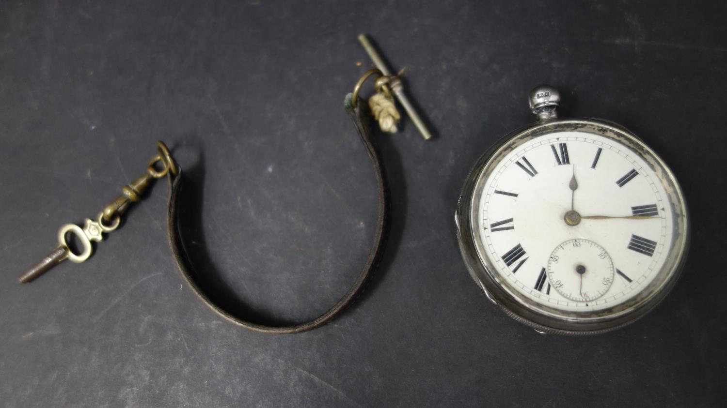 A silver open face pocket watch, Chester 1902, white Roman dial, seconds subsidiary dial at 6,