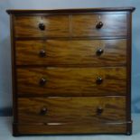 A Victorian mahogany chest of two over three long drawers, with solid top and plinth base, H.110 W.