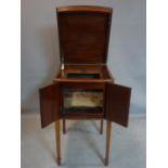 An Edwardian mahogany gramophone cabinet by Aeolian, raised on tapered legs and spade feet, H.91 W.