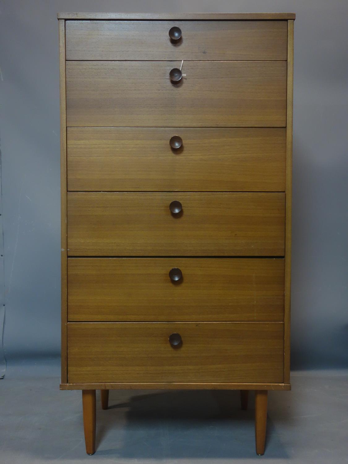 A 20th century teak pedestal chest of 6 drawers, raised on tapered legs, H.118 W.62 D.44cm