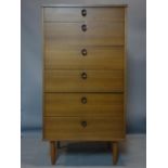 A 20th century teak pedestal chest of 6 drawers, raised on tapered legs, H.118 W.62 D.44cm