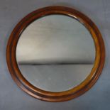 A circular mahogany mirror, Diameter 35cm