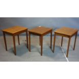 Three teak occasional tables on tapered legs, H.50 W.46 D.36cm