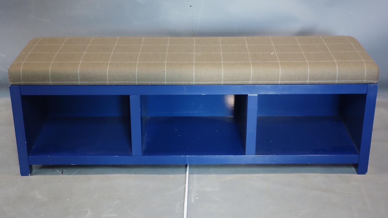 A Bernhardt Interiors ottoman bench with grey checked upholstered seat above blue painted base on