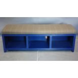A Bernhardt Interiors ottoman bench with grey checked upholstered seat above blue painted base on