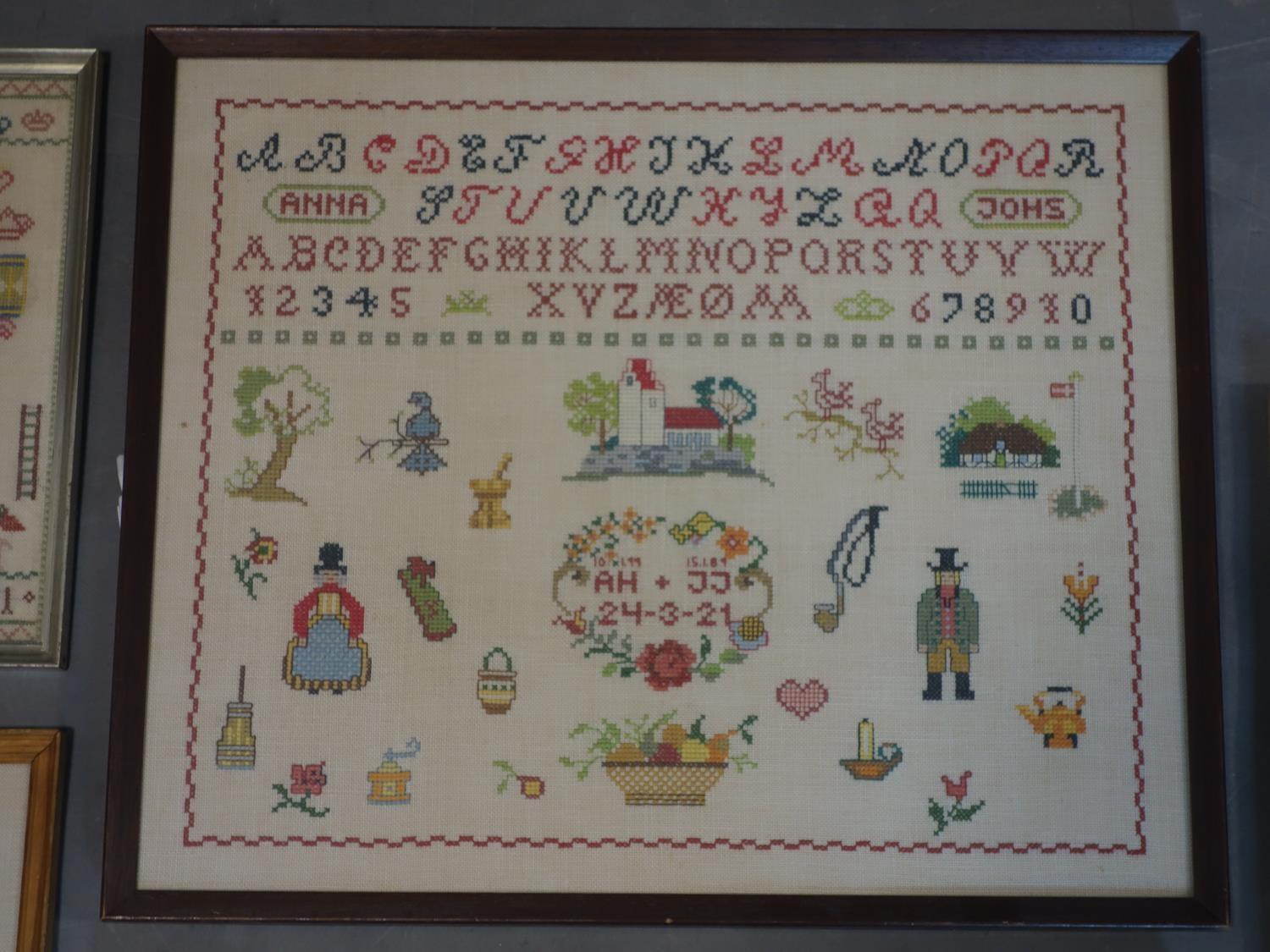 A collection of five 20th century Danish needlework samplers, with alphabets, numbers, figures, - Image 3 of 4