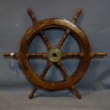 A 20th century ships wheel with brass centre, Diameter 80cm