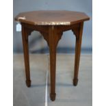 An oak occasional table hexagonal copper top, on square tapered legs and spade feet, H.54 W.54 D.