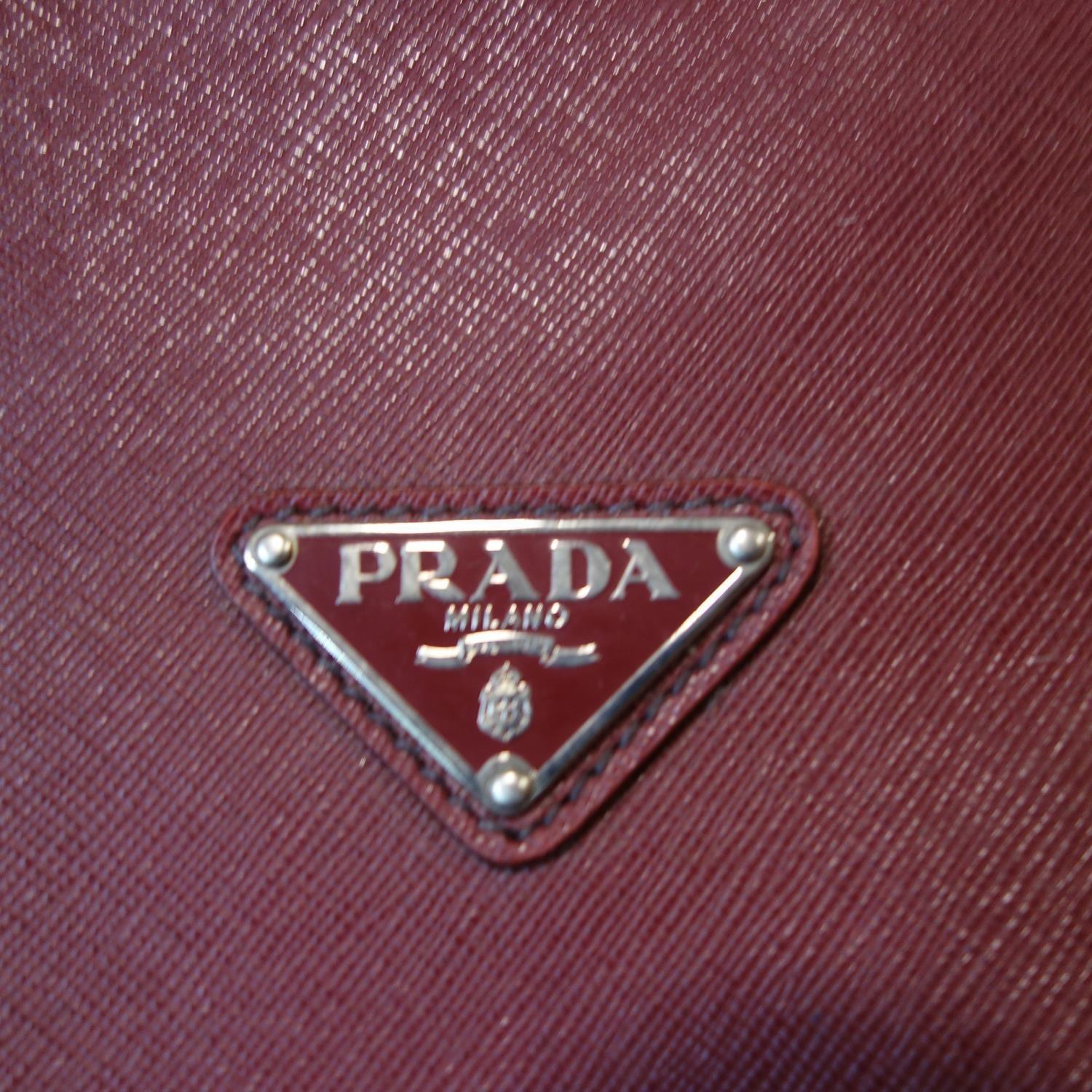 A Prada burgundy leather holdall bag. L.50cm - Image 2 of 2