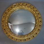 A 20th century gilt wood convex mirror, D.50cm