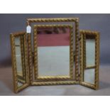 A 20th century gilt triptych dressing mirror, with central swing mirror, H.52 W.70cm