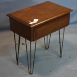A mahogany lamp table with single drawer raised on hairpin legs, H.57 W.56 D.35cm