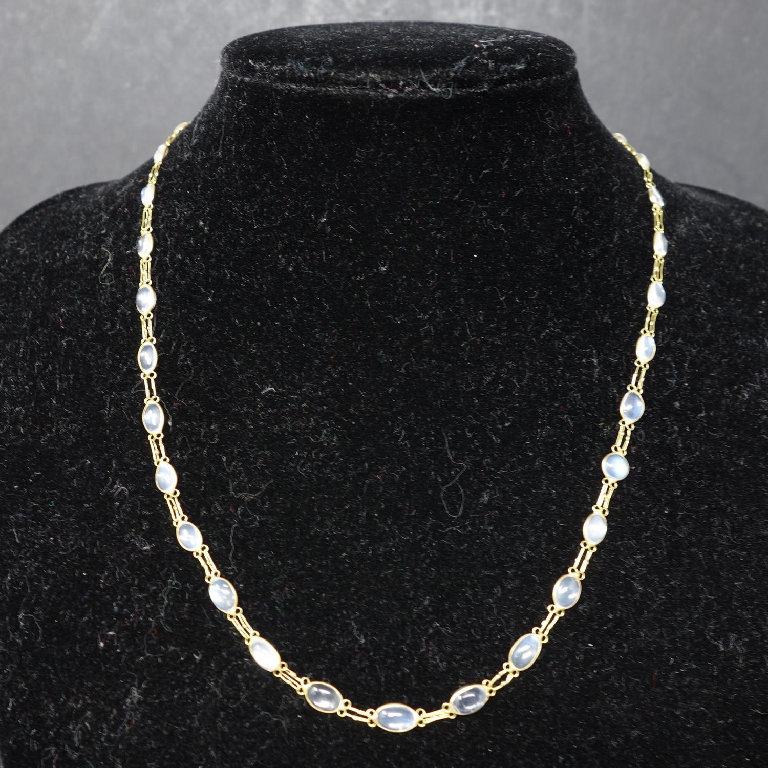 A 14ct gold necklace set with moonstones