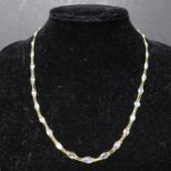 A 14ct gold necklace set with moonstones