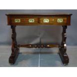 A 19th century mahogany campaign writing table with two drawers, on trestle supports and castors,