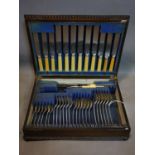 A vintage silver plated canteen of cutlery by Viner & Hall Sheffield, in oak case, incomplete