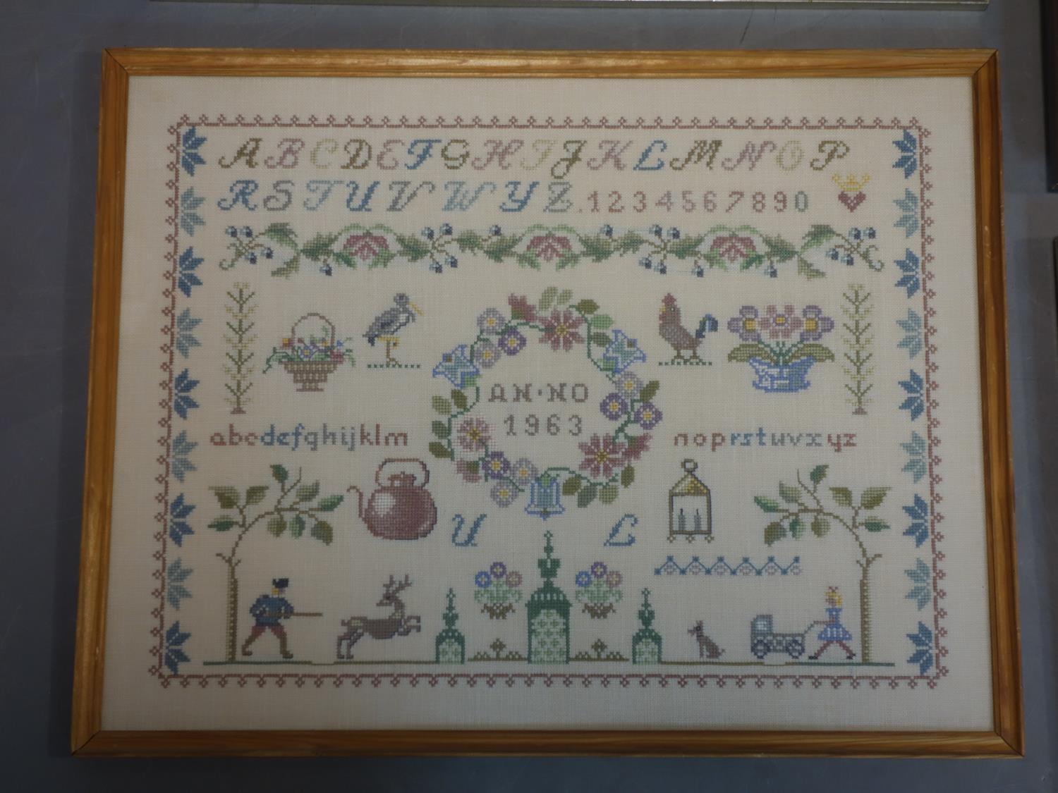 A collection of five 20th century Danish needlework samplers, with alphabets, numbers, figures, - Image 2 of 4