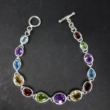 A silver and multi gem stone bracelet, marked 925, L.19.5cm