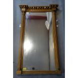 A Regency carved giltwood rectangular pier mirror, with later bevelled glass plate, 104 x 64cm