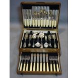 An oak canteen of silver plated cutlery, to include knives, forks, spoons, serving spoons,